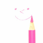 ピンクの色鉛筆と顔のイラスト
